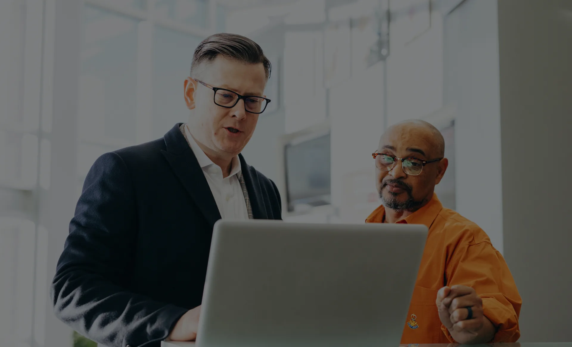 AI leaders reviewing a business initiative together